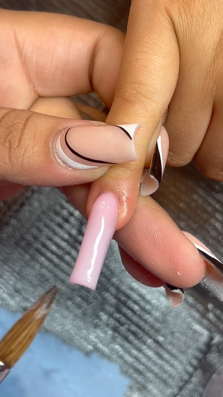 Elegant Pink and Black Nail Design