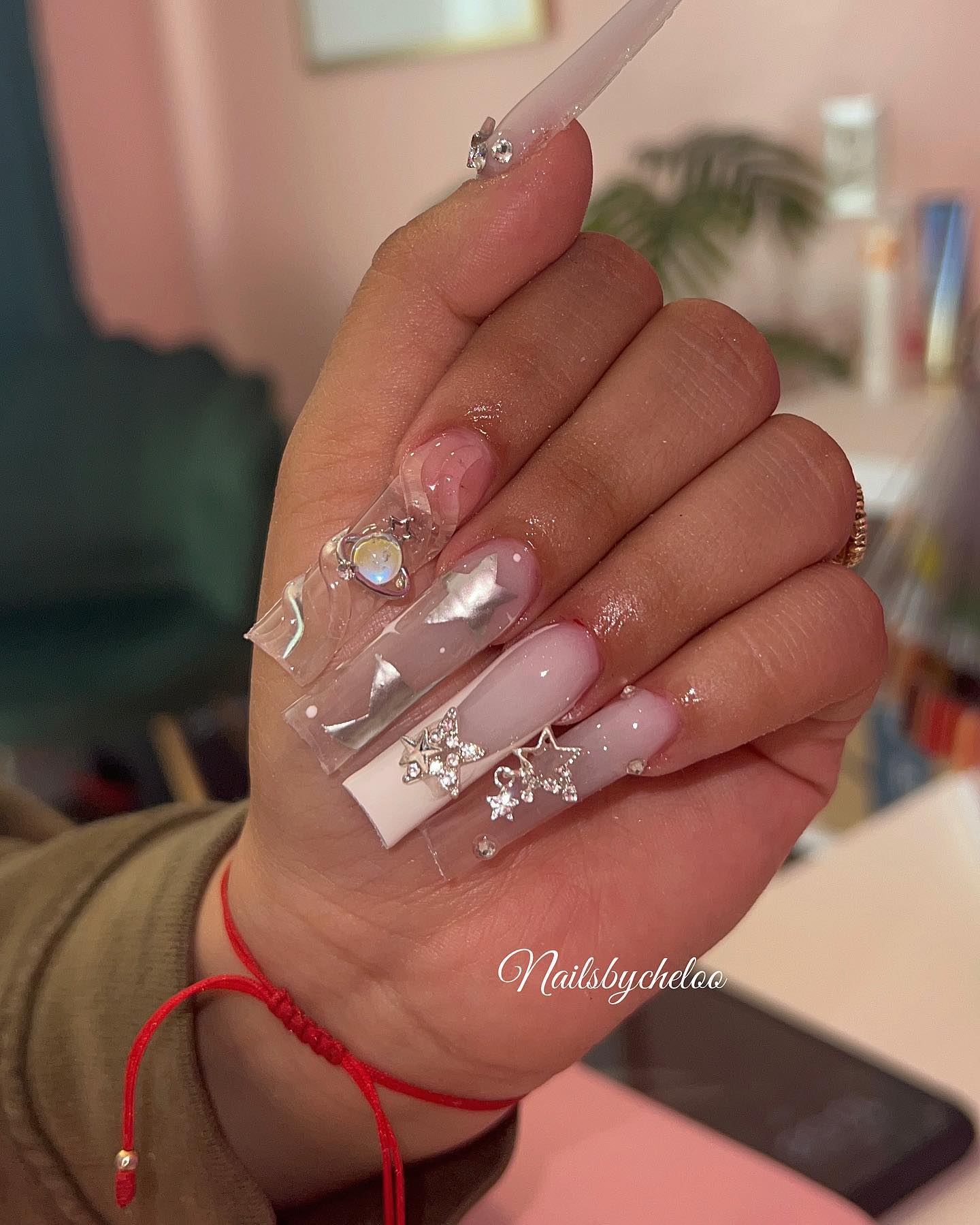 Artistic Nail Design with Rhinestones