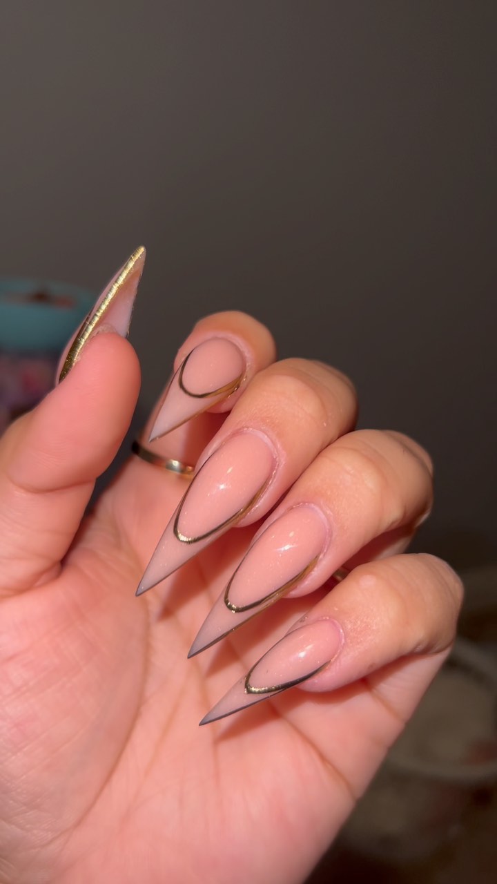 Stylish Stiletto Nails with Gold Accents