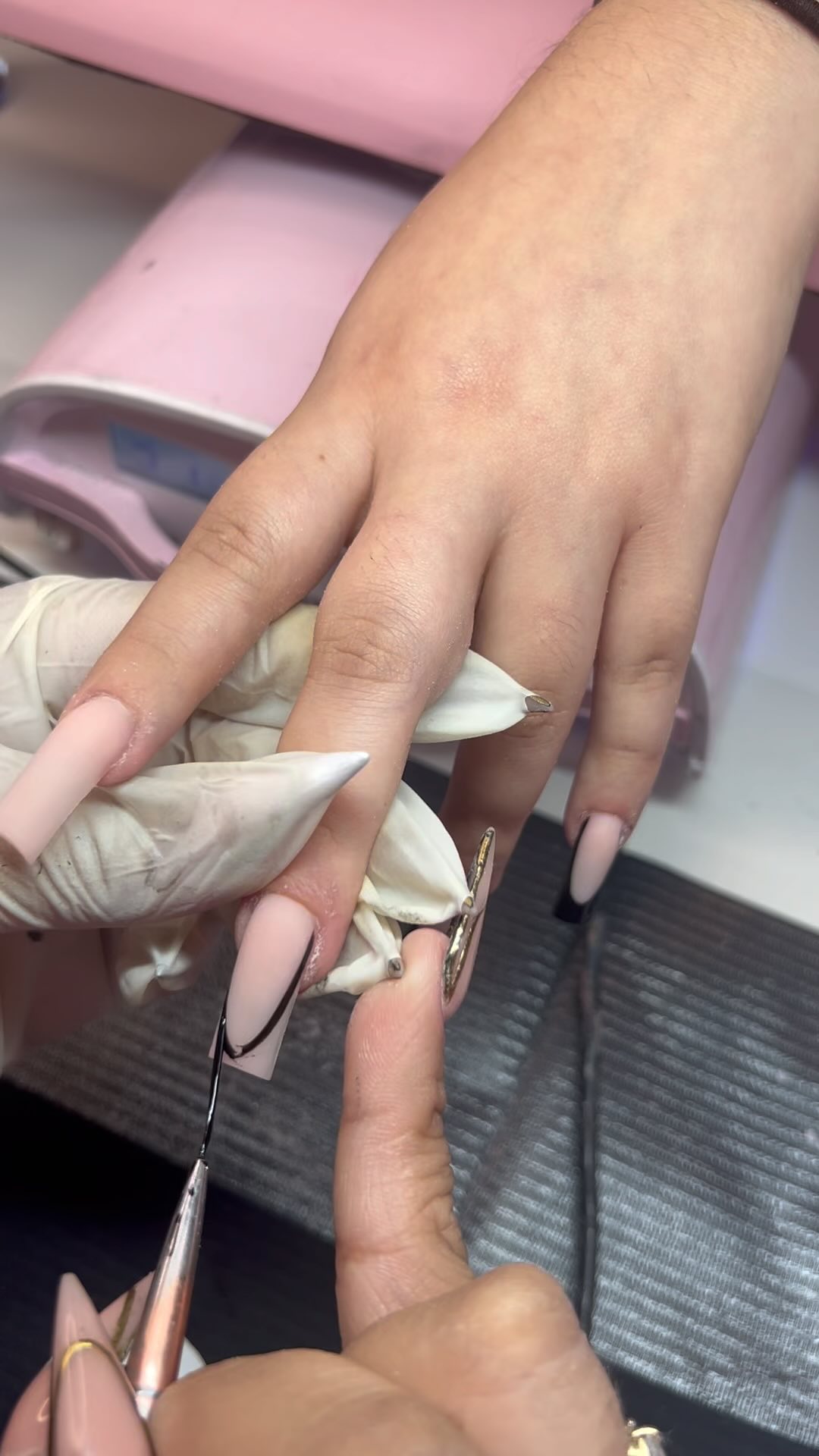 Elegant Pink Stiletto Nails with Artistic Design