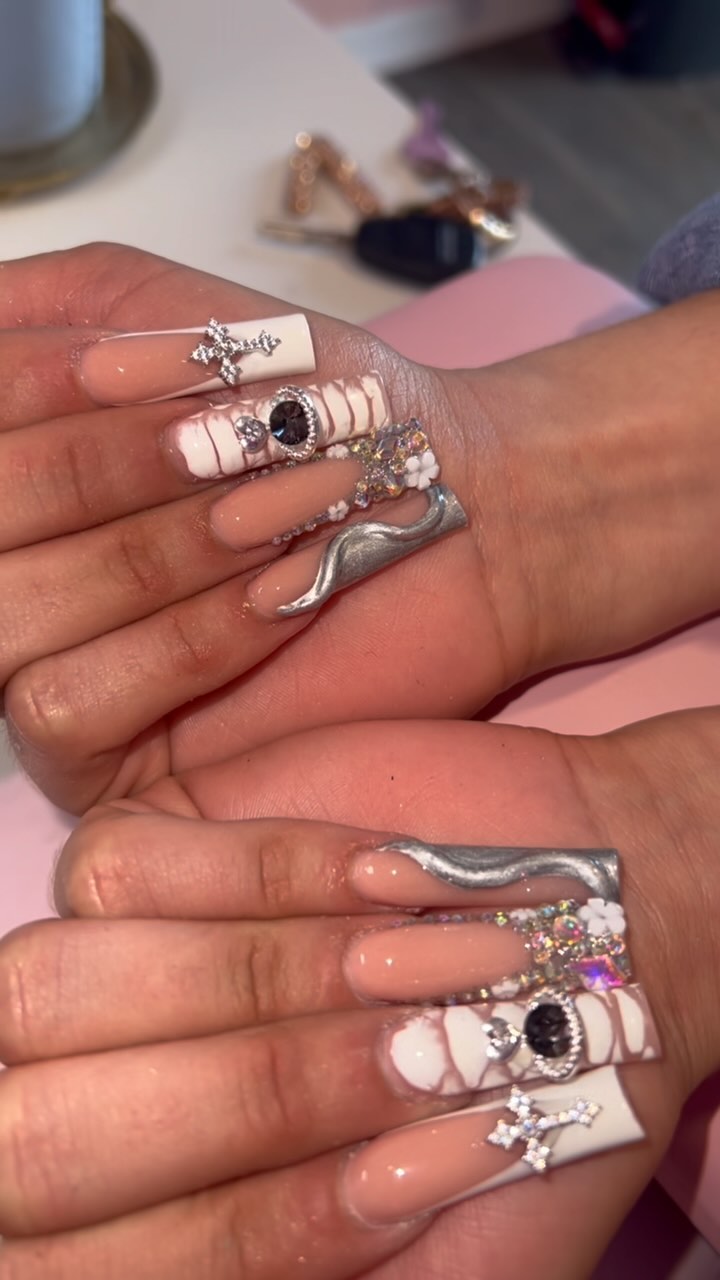 Artistic Nude and Silver Nail Design