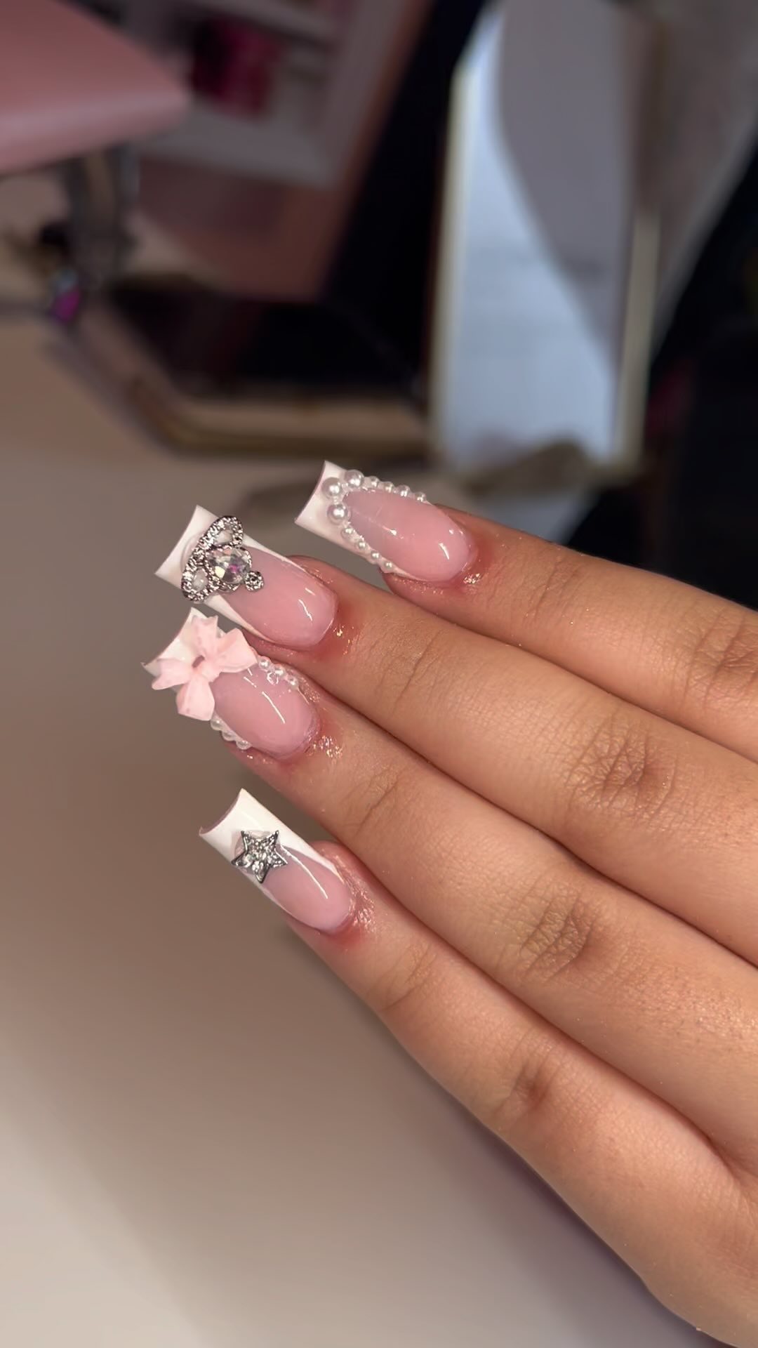 Elegant Pink and White Nails with Gems