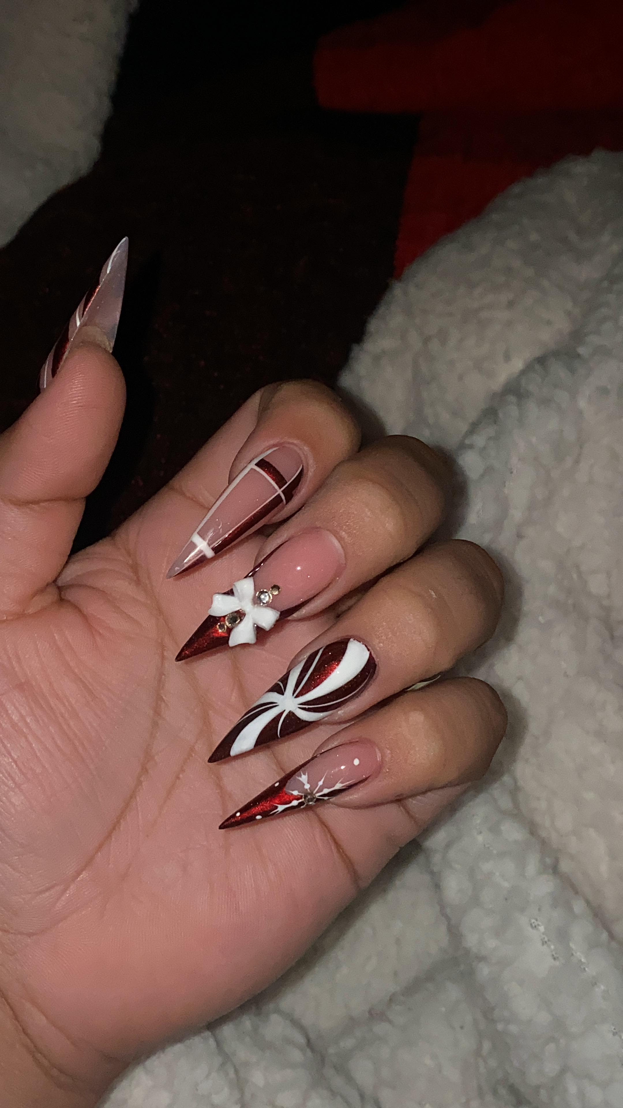 Artistic Red and White Nail Design
