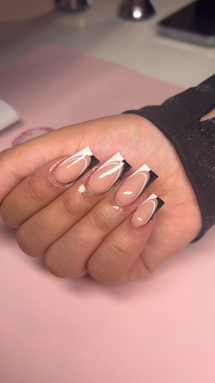 Stylish Nail Design with Black and White Accents