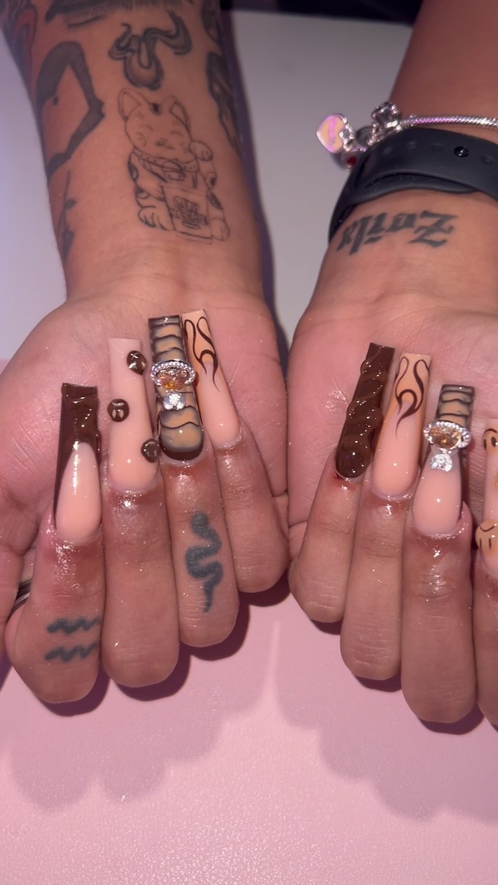 Artistic Nail Design with Brown and Nude Tones