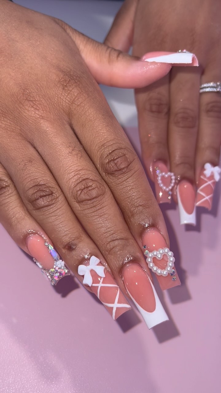 Elegant Pink and White Nails with Charms