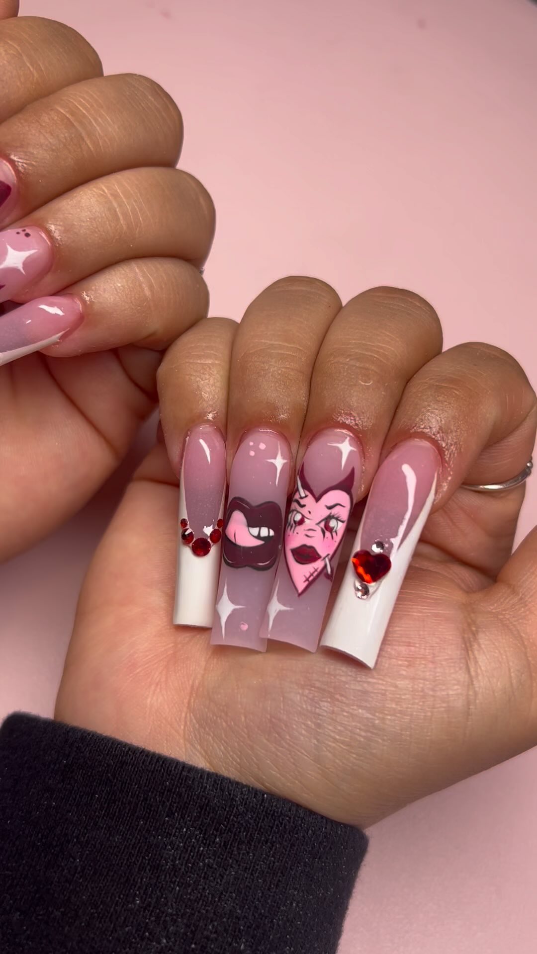 Artistic Nail Design with Character Illustrations
