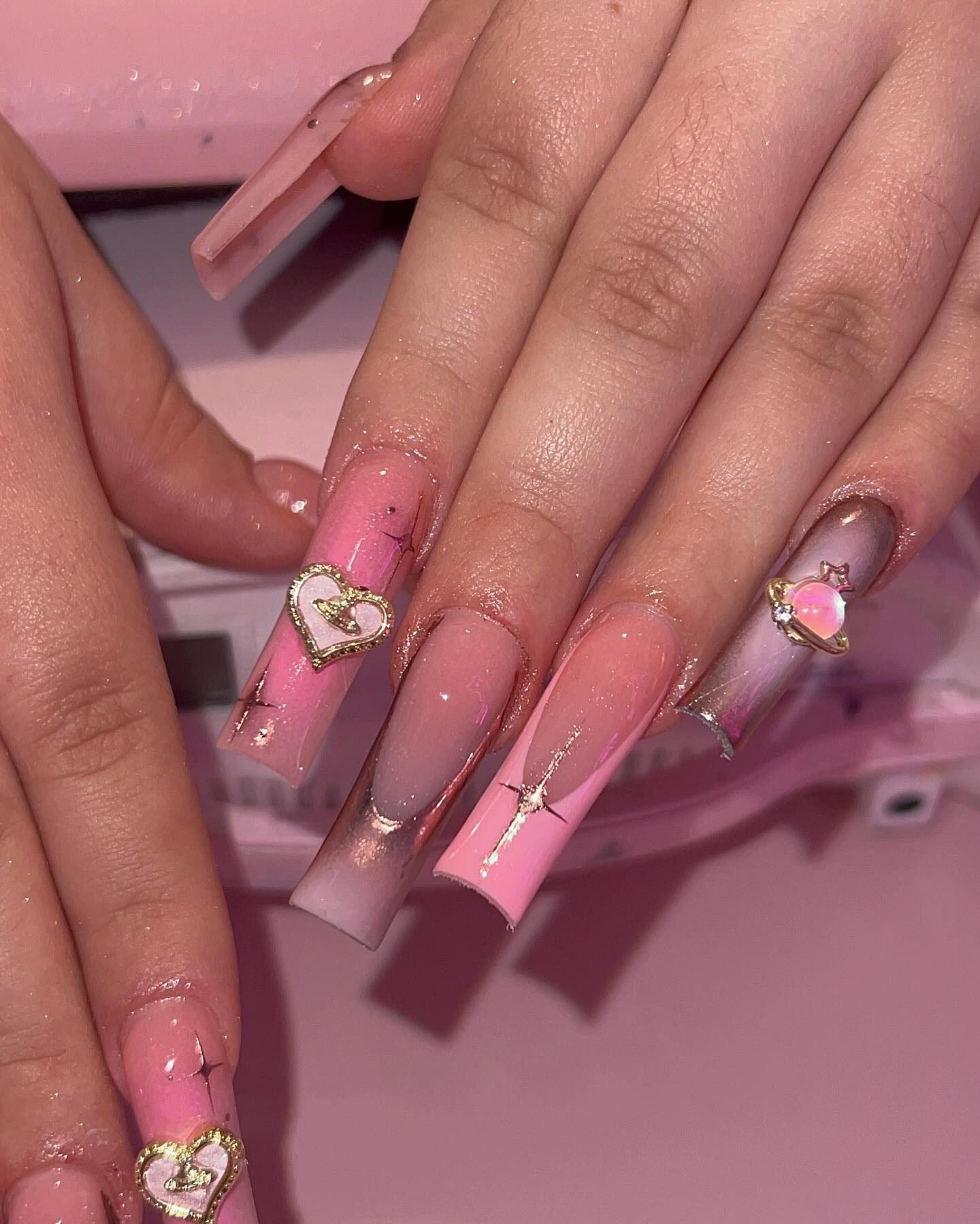 Artistic Pink Nails with Gems