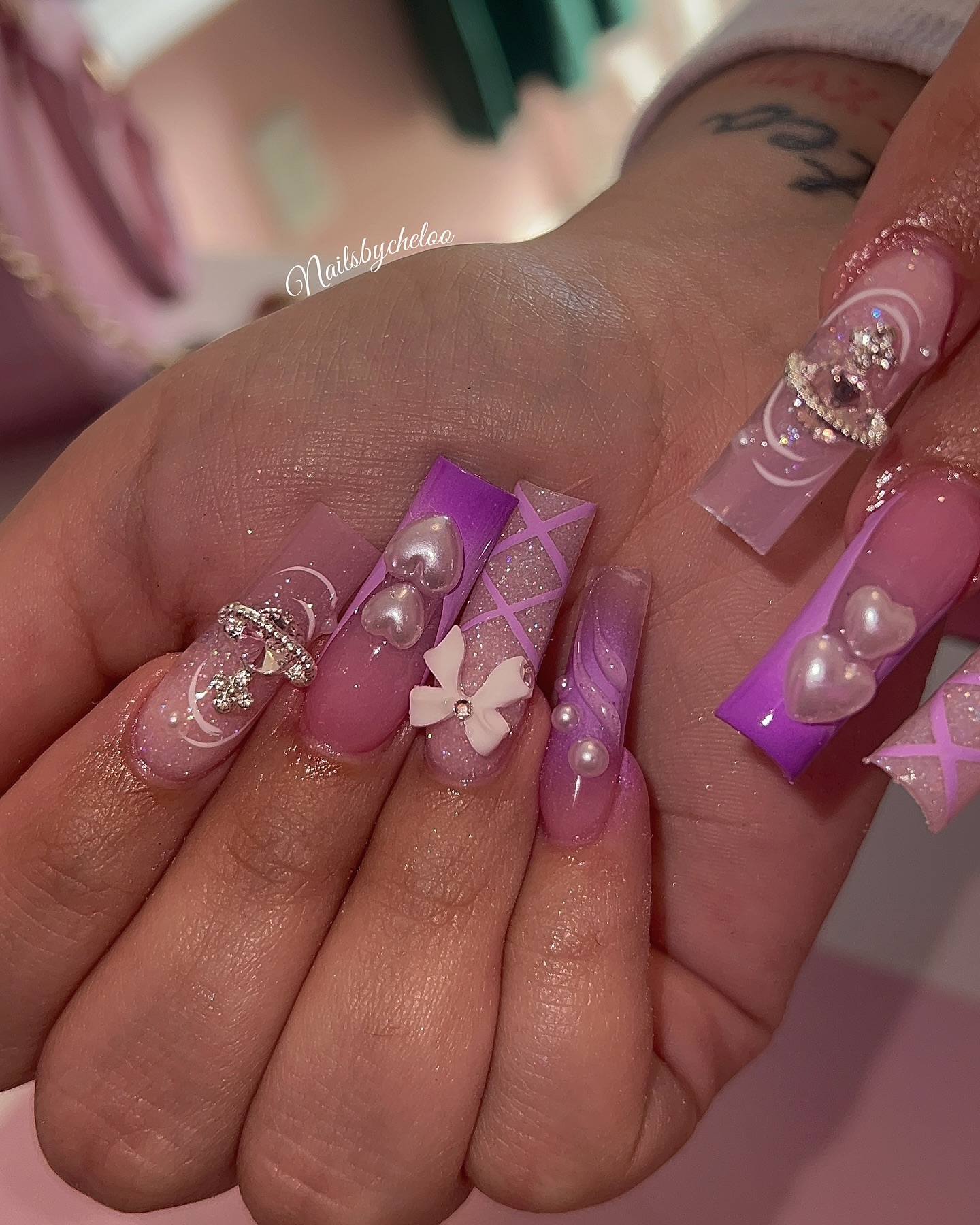 Stylish Purple and Nude Nails with Gems