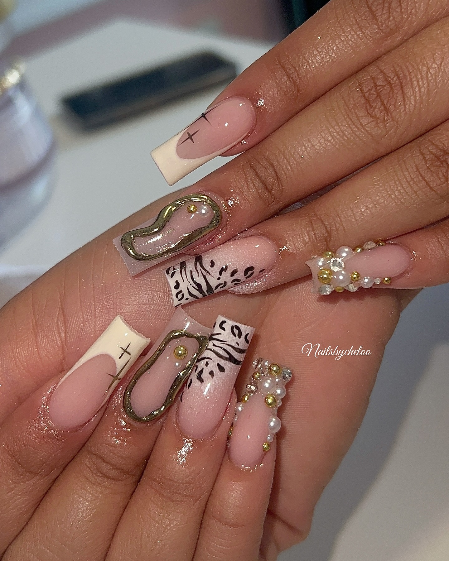 Artistic Nude and Gold Nails