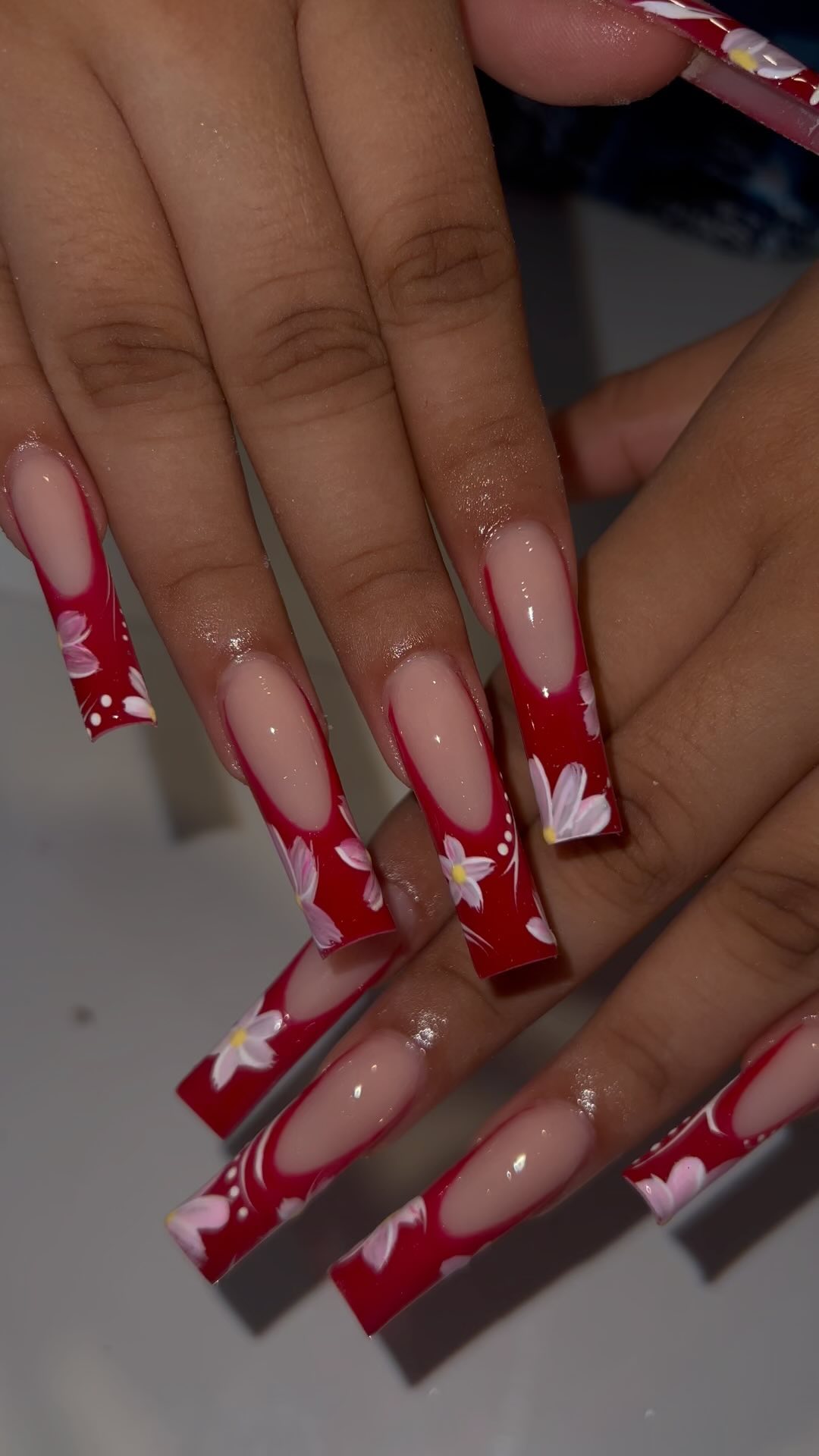 Artistic Red and Floral Nails