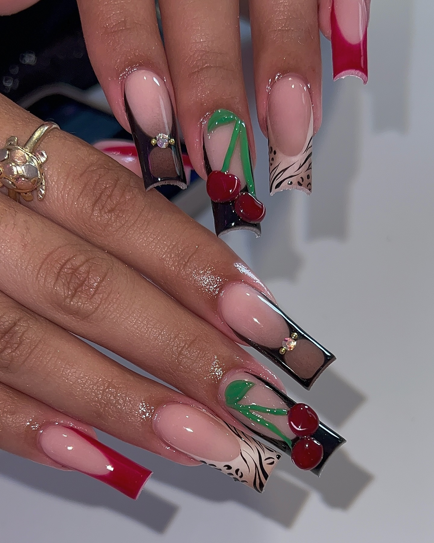 Artistic Cherry Nail Design