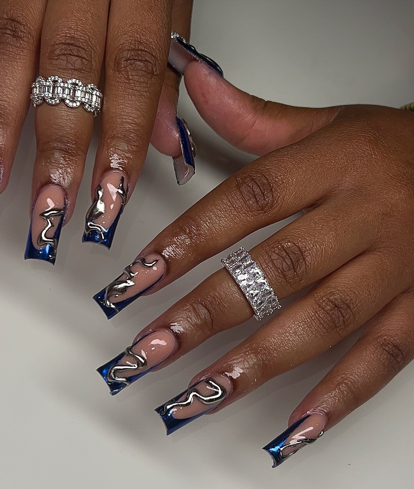Elegant Blue and Nude Nail Design
