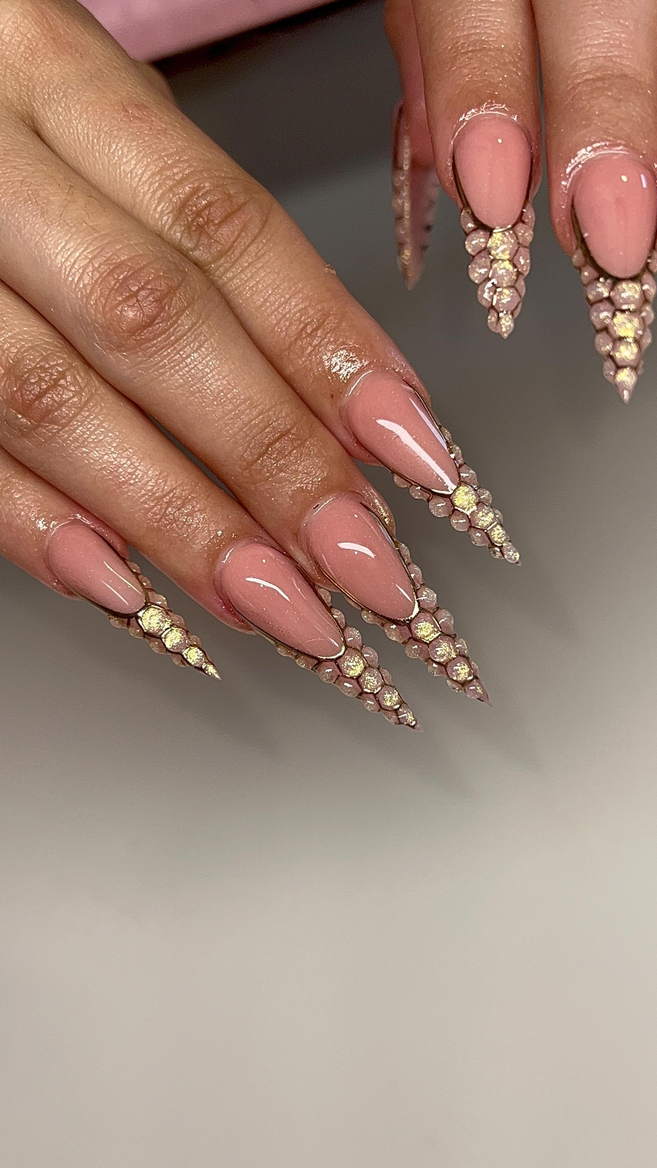Elegant Pink Stiletto Nails with Rhinestones