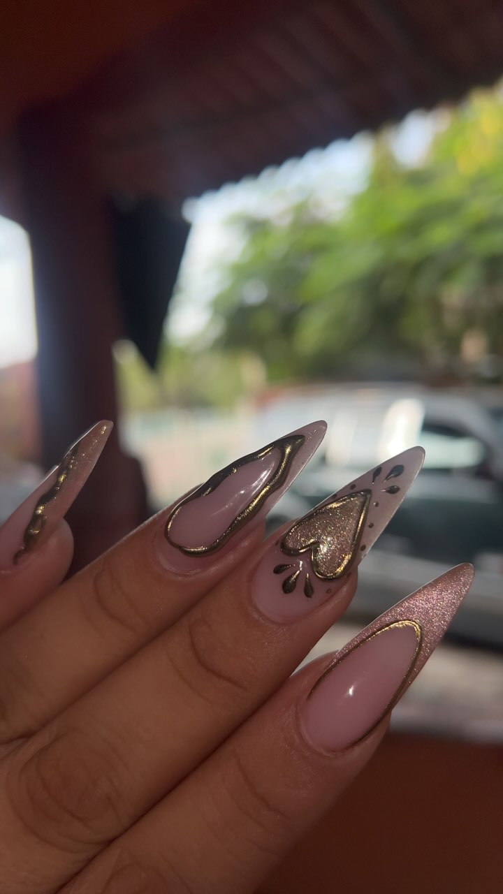 Elegant Gold and Nude Stiletto Nails