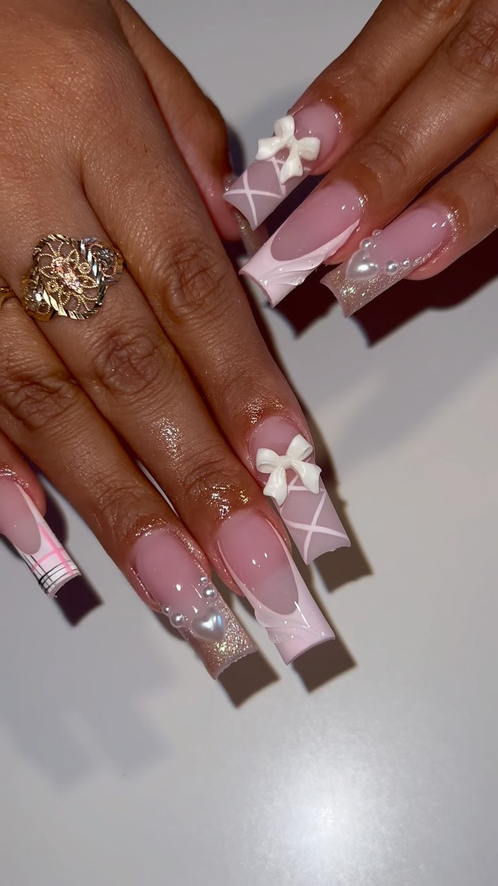 Elegant Pink Bows and Pearls Nails