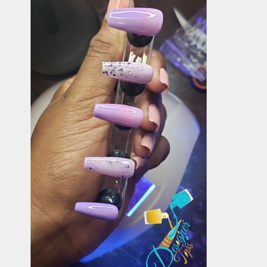 Elegant Purple Nails with Glitter Accents