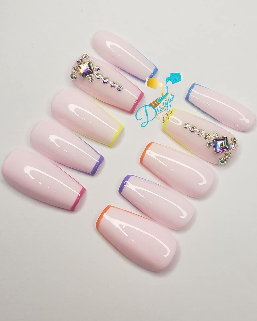 Elegant Pink Ombre Nails with Gems