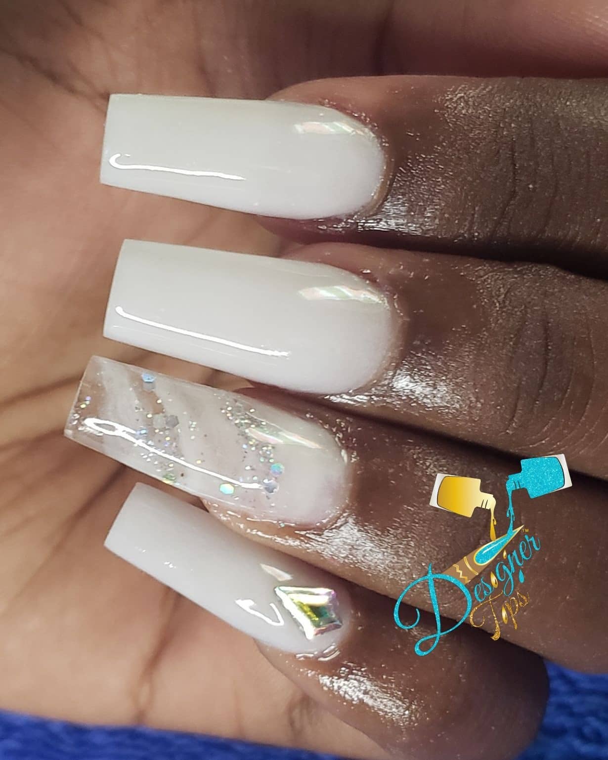 Elegant White Nails with Glitter Accents