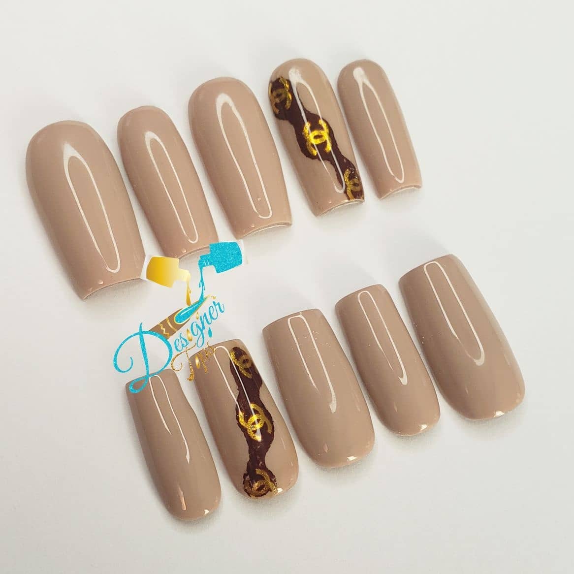Stylish Nude Nails with Gold Pattern