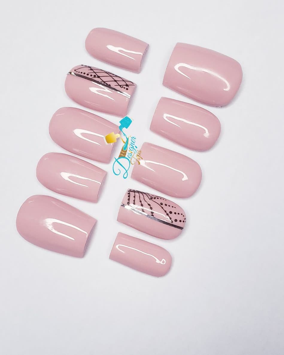 Stylish Pink Nails with Artistic Design