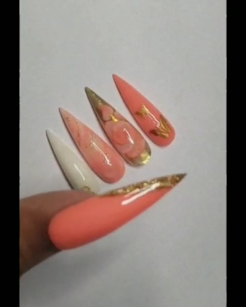 Elegant Coral Stiletto Nails