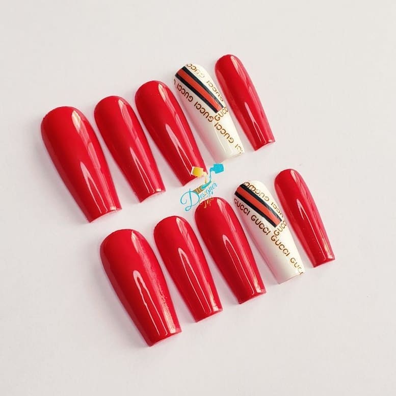 Elegant Red Nails with Gucci Detailing