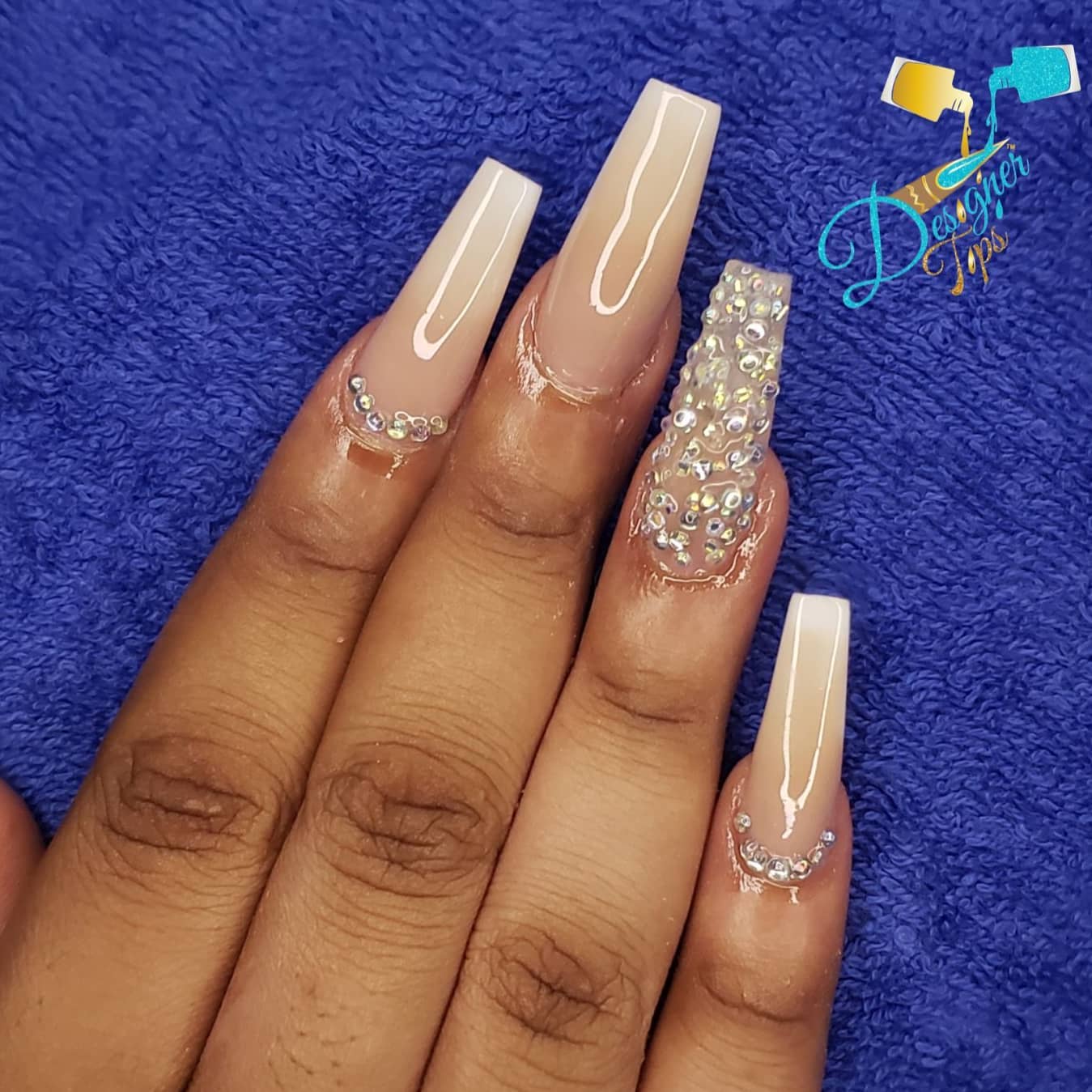 Elegant Nude and Gems Nails