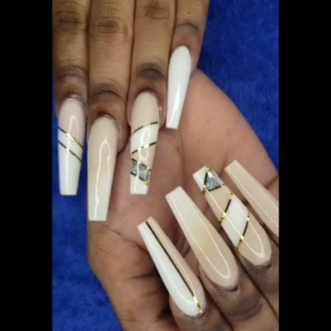 Elegant Nude Nails with Gold Accents
