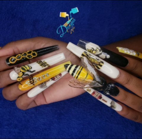 Artistic Bee-Inspired Nail Design