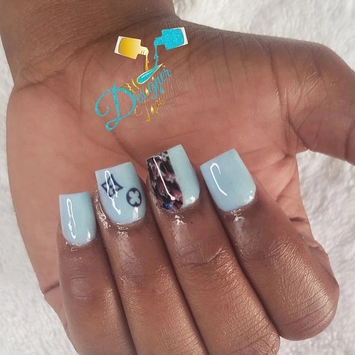 Artistic Light Blue Nails with Patterns