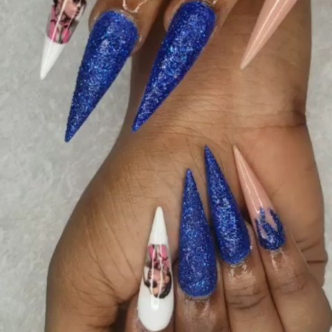 Stunning Blue Glitter Stiletto Nails