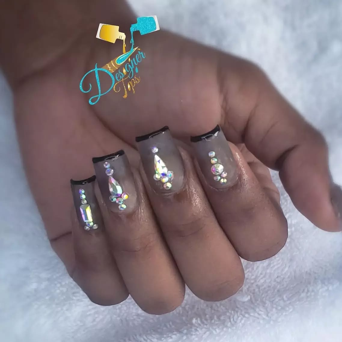 Elegant Nude and Black Rhinestone Nails