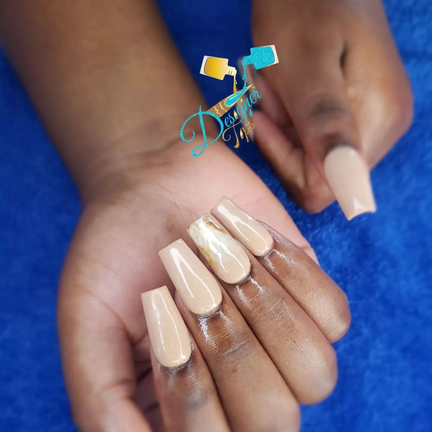 Elegant Nude Nails with Artistic Detail