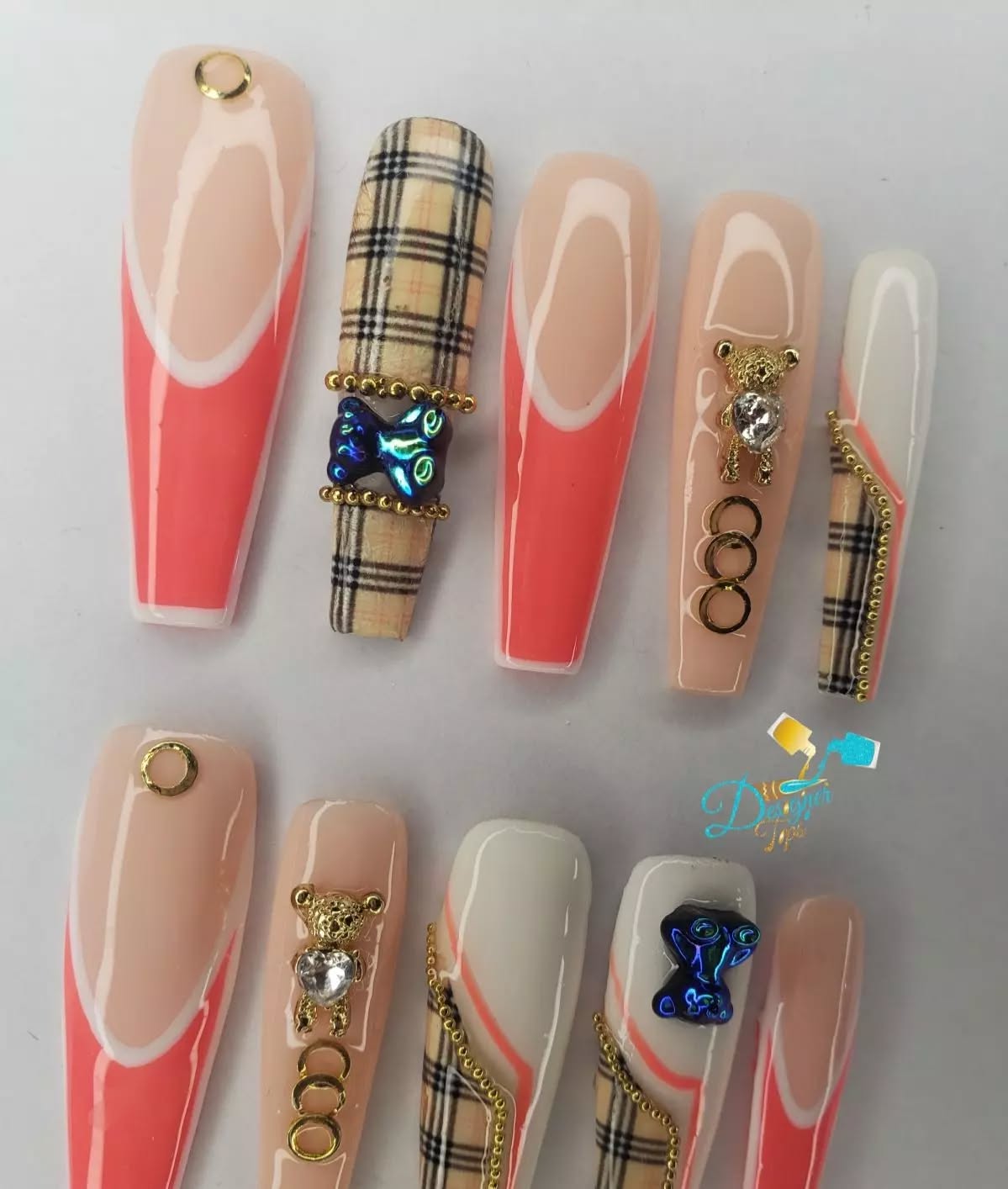 Artistic Coral and Nude Nails