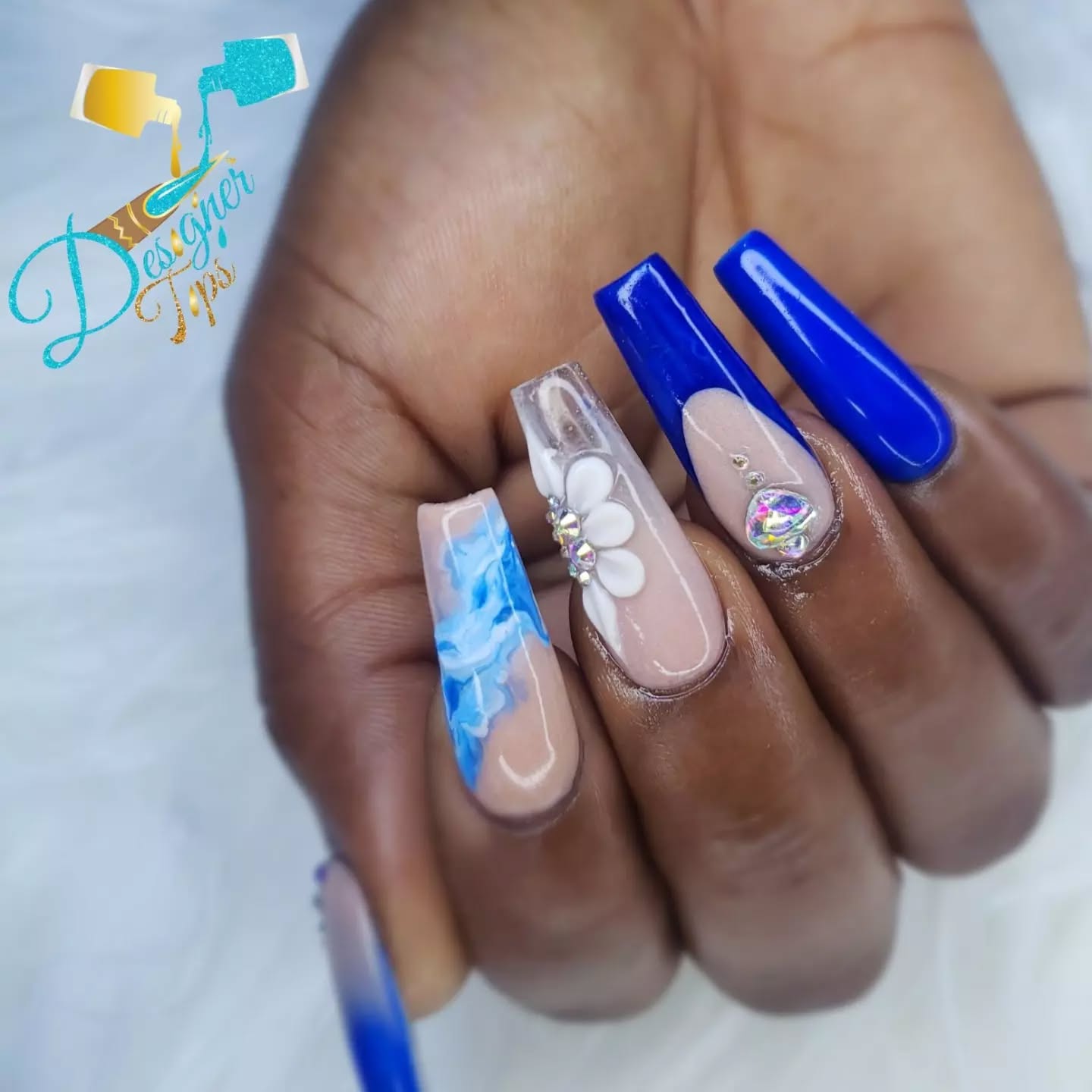 Artistic Blue and White Floral Nail Design