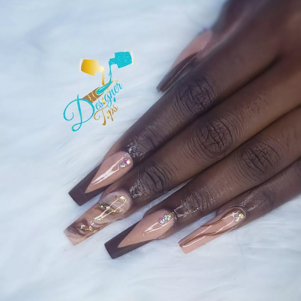 Elegant Nude Nail Design with Gems