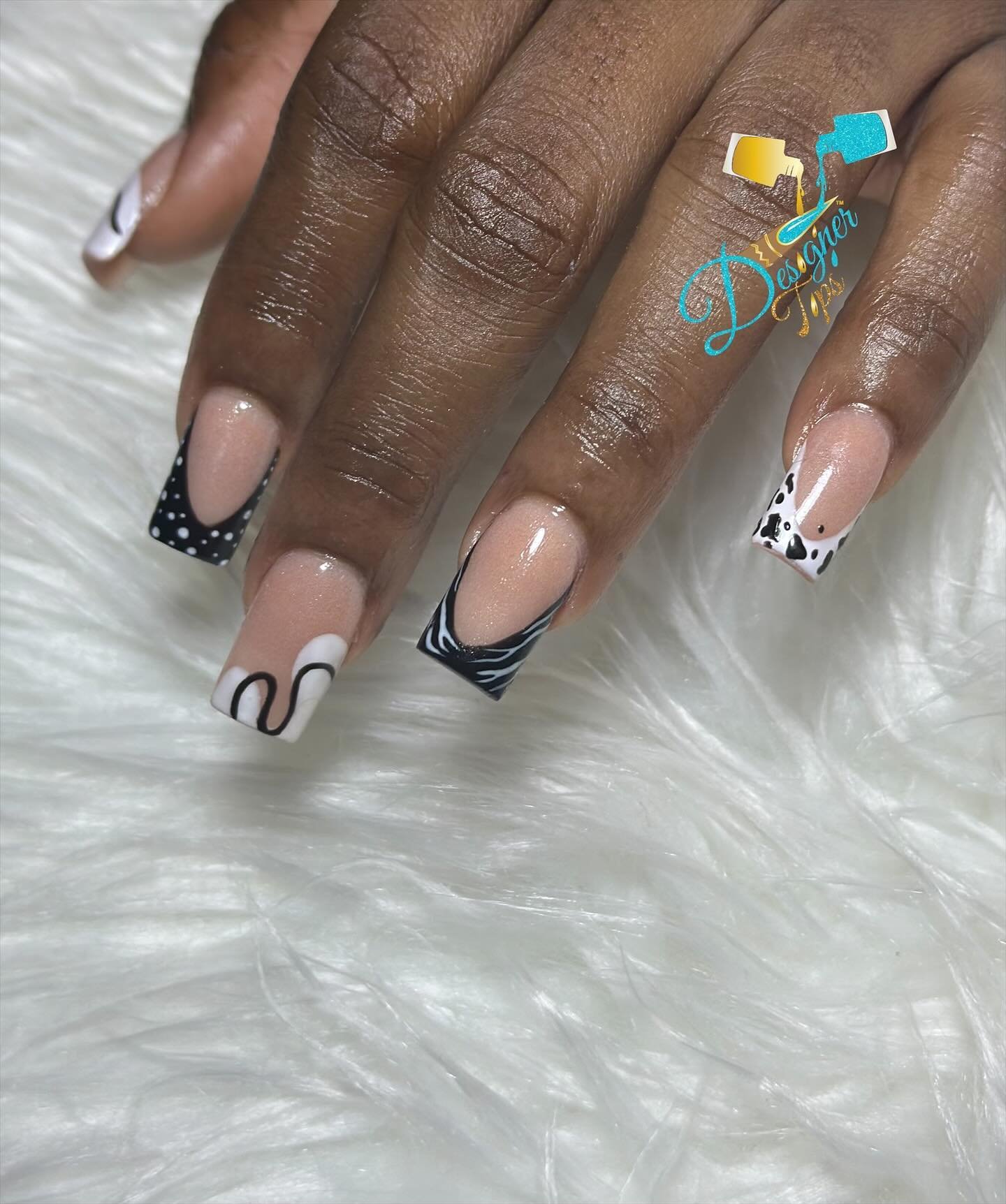 Artistic Black and White Nail Design