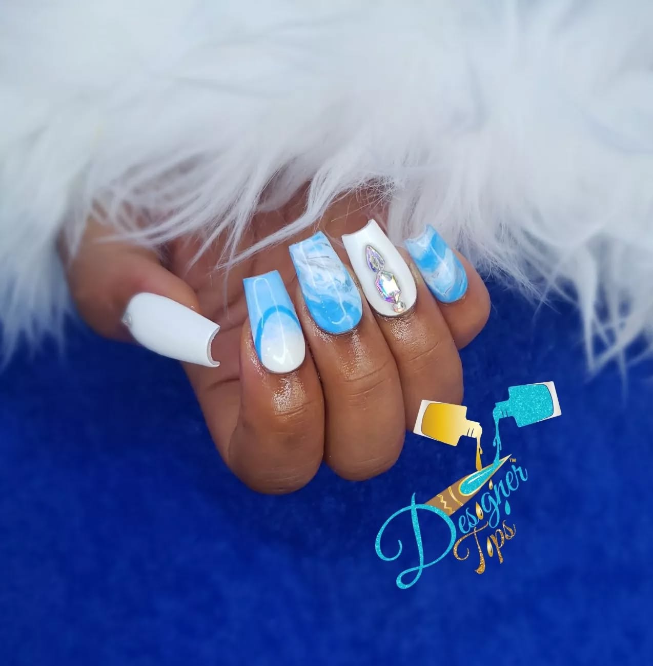 Artistic Blue and White Nails