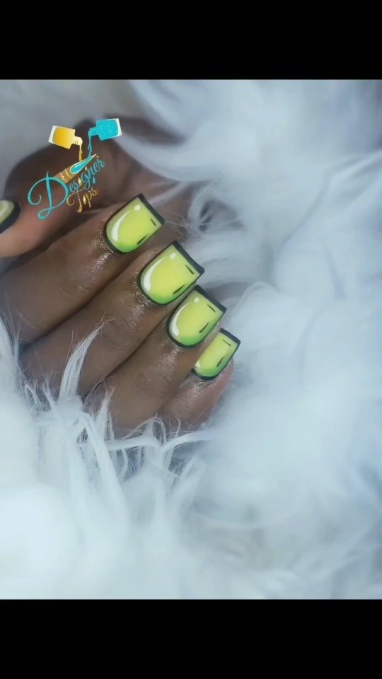 Artistic Green and Black Nail Design