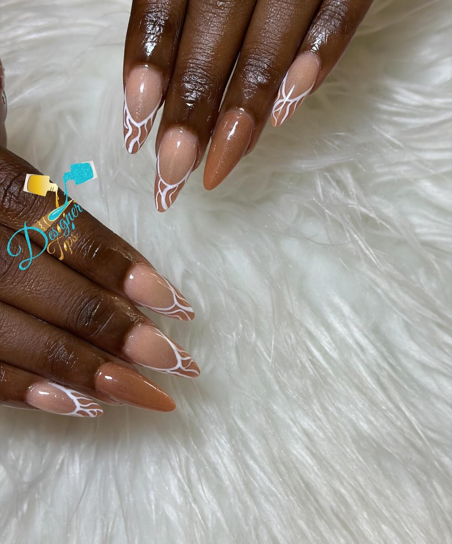 Artistic Stiletto Nails with White Pattern