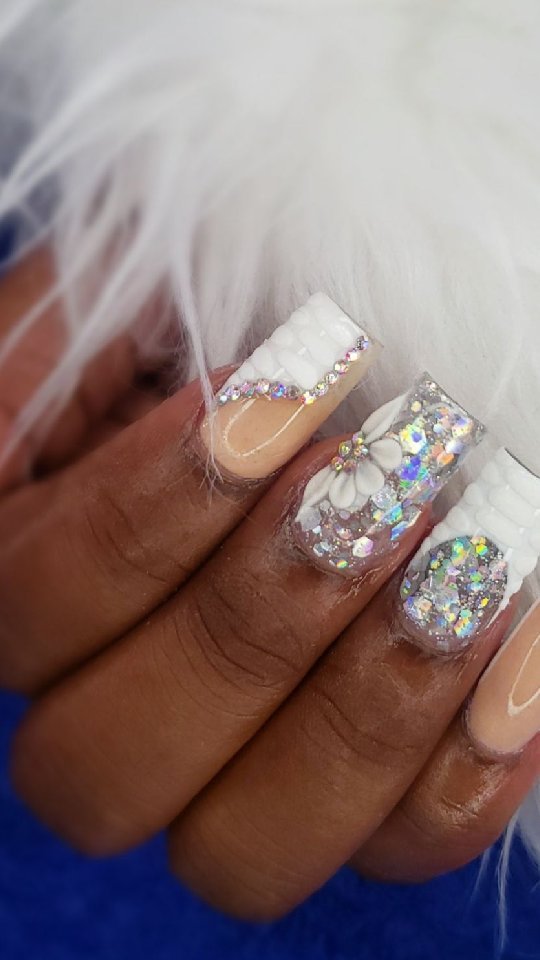 Elegant Glitter and Floral Nails