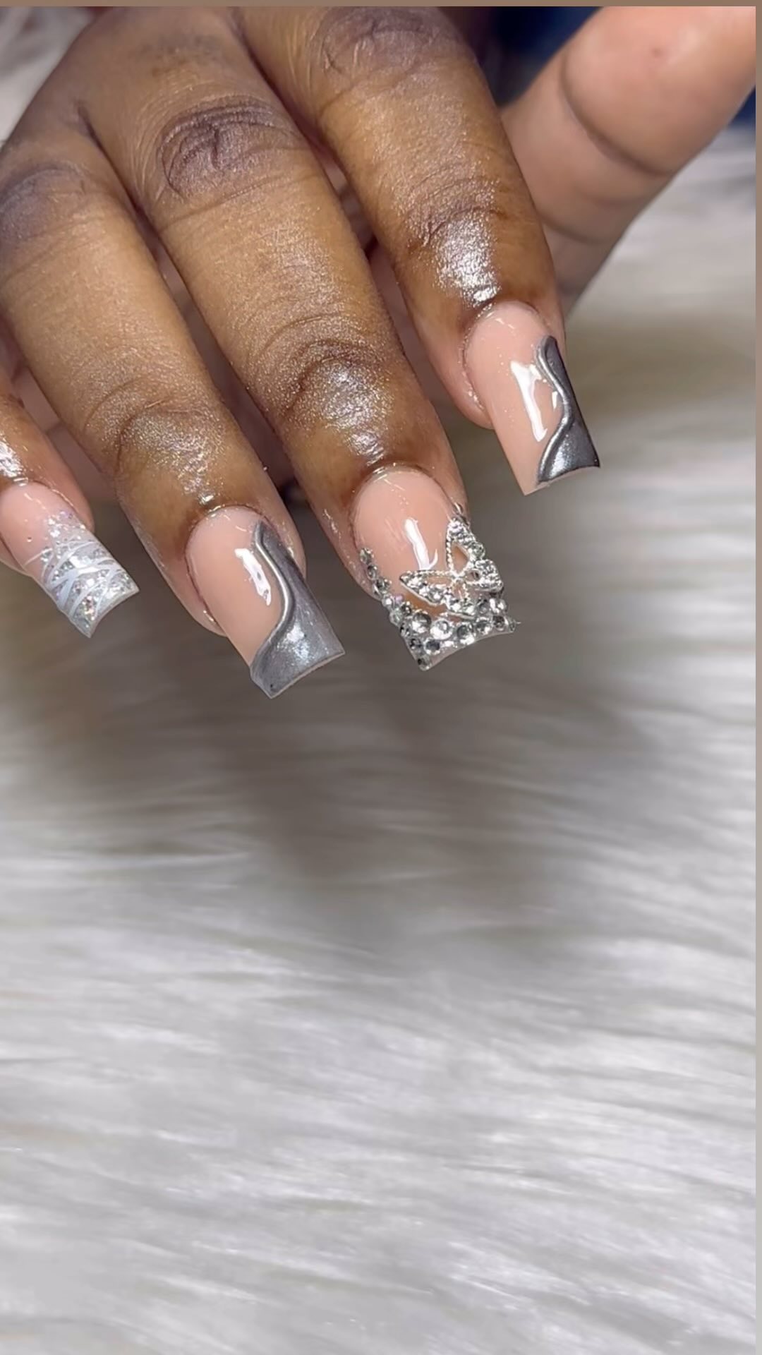 Elegant Silver and Nude Nail Design