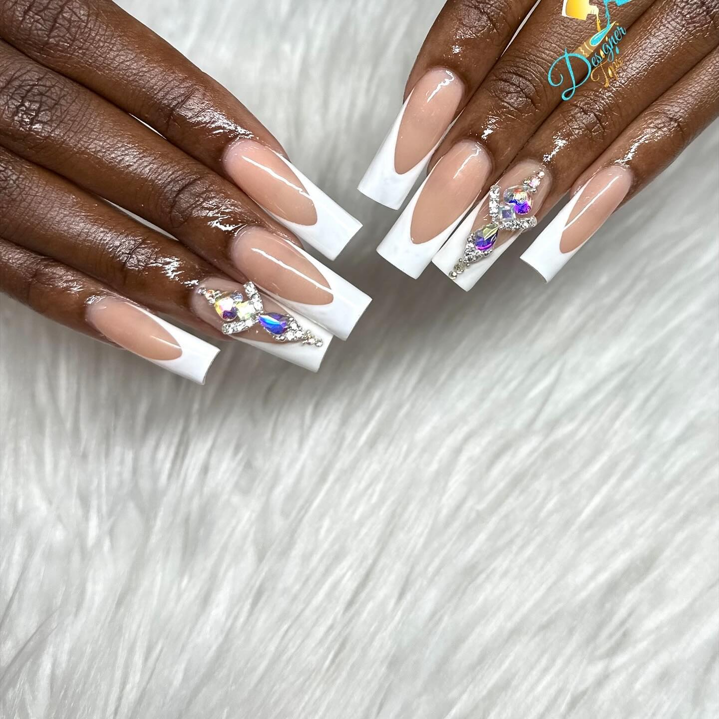 Elegant Nude and White French Tip Nails with Gems