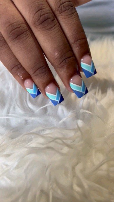 Artistic Blue and White Geometric Nails