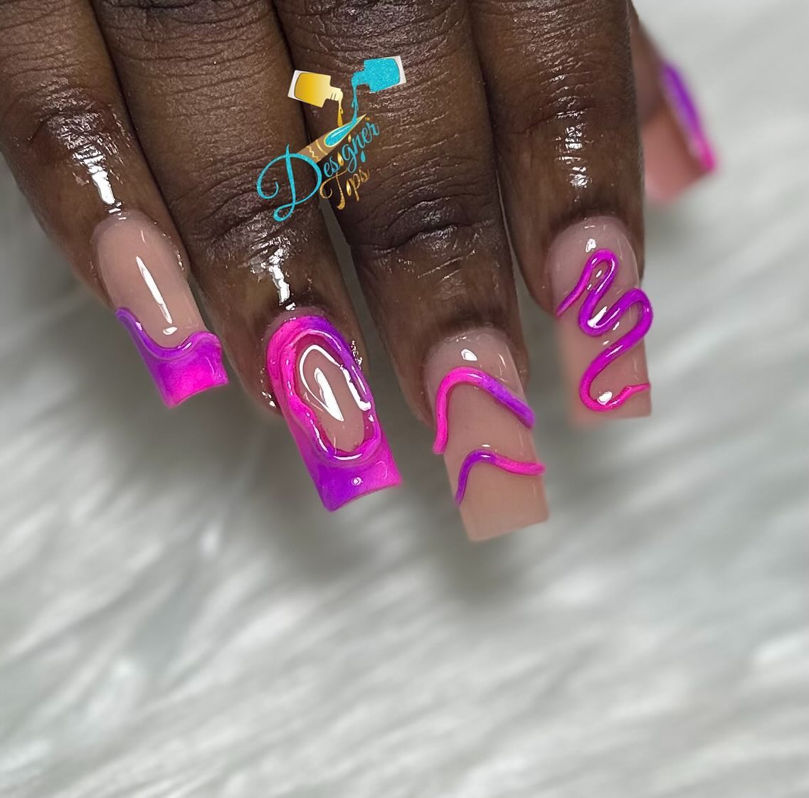 Artistic Pink and Purple Nail Design