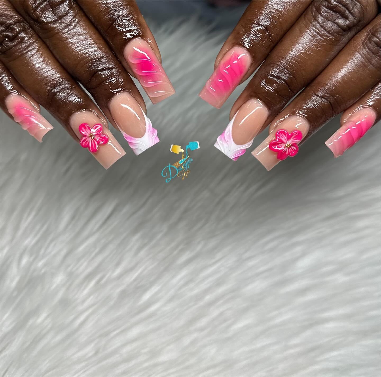 Artistic Nail Design with Pink Flowers