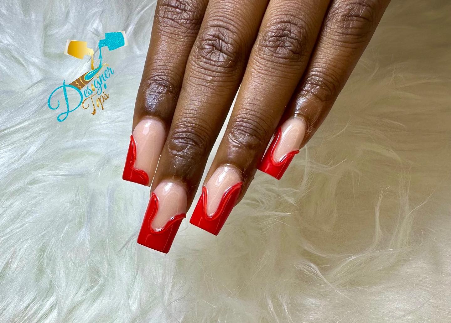 Artistic Red and Nude Nail Design