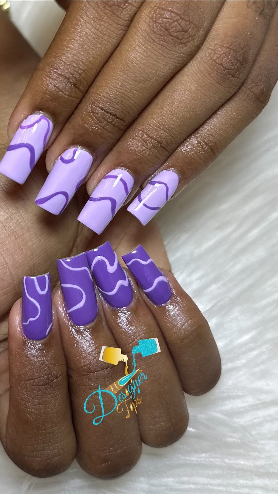 Artistic Purple Nail Design