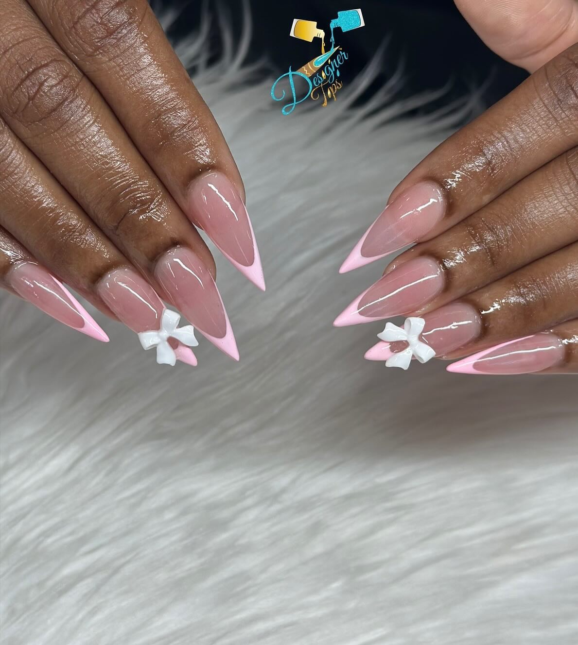 Elegant Pink French Tip Nails with Floral Accents
